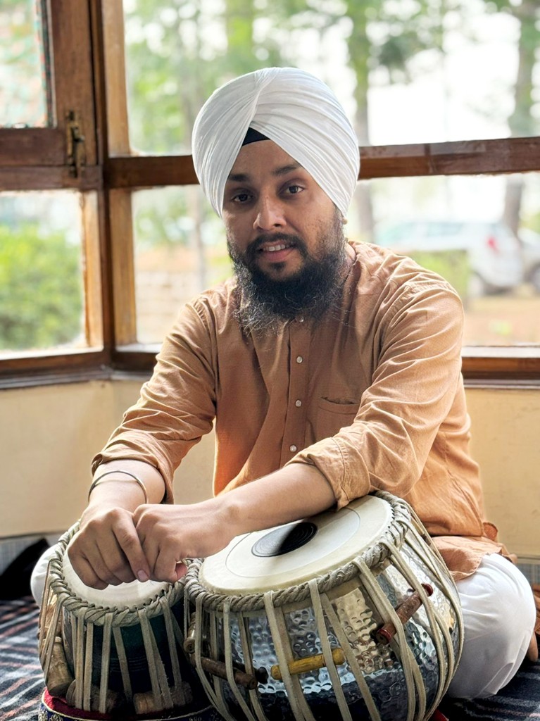 Anikbar Singh playing tabla